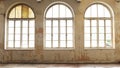 Industrial vintage interior with bright light coming through windows. Royalty Free Stock Photo