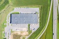 Industrial warehouse with lots of trucks. aerial top view