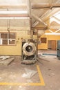 Industrial Washing machine, in abandoned, derelict, Hospital laundry room. Royalty Free Stock Photo