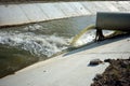 Polluted water overflow into the river Royalty Free Stock Photo