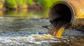 Industrial wastewater discharge, Sewage pipe transporting polluted water into the canal, Environmental Pollution and contamination Royalty Free Stock Photo