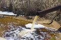 The Industrial Wastewater is Discharged from the Pipe Royalty Free Stock Photo