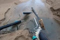 Industrial wastewater, the pipeline discharges liquid industrial waste into the sea on a city beach. Dirty sewage flows from a