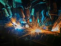 Industrial welding robots are movement welding in production line Royalty Free Stock Photo