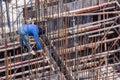 Industrial welding worker for steel work construction in area building with Welding process by Shielded Metal Arc Welding Royalty Free Stock Photo