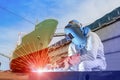 Industrial worker welding in factory or Ship repair