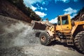 Industrial wheel loader working on construction site. Royalty Free Stock Photo