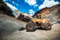 Industrial wheel loader working on construction site Royalty Free Stock Photo