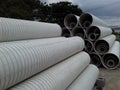 White Metal Pipes Stacked On Each Other
