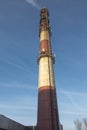 Industrial white, red, high concrete chimney Royalty Free Stock Photo