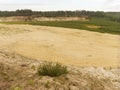 Industrial white sand quarry, sand pit. Restoration of a part of the mined quarry, Royalty Free Stock Photo