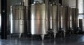 Industrial wine fermenters Royalty Free Stock Photo