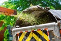 industrial wood chipper loading truck with mulch Royalty Free Stock Photo