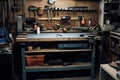 an industrial workbench with tools and supplies in the background