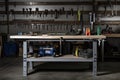 an industrial workbench with tools and supplies in the background Royalty Free Stock Photo