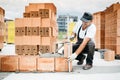 Construction worker building walls and working with bricks on construction site Royalty Free Stock Photo