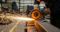 Industrial worker grinding metal sparks flying manufacturing workshop Royalty Free Stock Photo