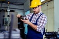 Industrial worker inspector measuring detail with Vernier Caliper Royalty Free Stock Photo