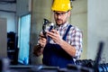 Industrial worker inspector measuring detail with Vernier Caliper Royalty Free Stock Photo