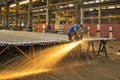 Industrial worker making sparks