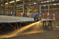 Industrial worker making sparks