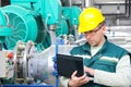 Industrial worker with notebook