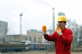 Industrial Worker Talking on Walkie-Talkie Royalty Free Stock Photo