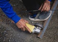 Industrial Worker Using Angle Grinder and Cutting a Metal Royalty Free Stock Photo