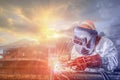 Industrial worker welding in construction site Royalty Free Stock Photo