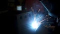 Industrial worker welding, slow motion. Clip. Metal Welding Close-Up in super slow motion. Close-up. Welder in