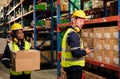 Industrial worker working at warehose factory Royalty Free Stock Photo