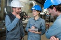 industrial workers checking welding metal profiles Royalty Free Stock Photo