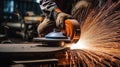 Industrial workers in a factory welding steel structure with sparks. Metalwork manufacturing Royalty Free Stock Photo