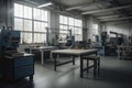 an industrial workspace, with furniture and tools in place for a variety of manufacturing processes