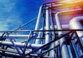 Industrial Steel pipelines and valves against blue sky Royalty Free Stock Photo