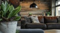 This industrialinspired living space is softened by the addition of a wood grain feature wall adding warmth and Royalty Free Stock Photo
