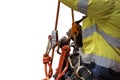 Industry abseiler worker working at height abseiling removing rope from chest harness croll safety device Royalty Free Stock Photo