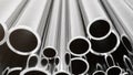 Industry business production and heavy metallurgical industrial products, many shiny steel pipes, industrial background Royalty Free Stock Photo