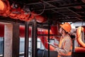 Industry engineer under checking the industry cooling tower air conditioner is water cooling tower air chiller HVAC of large indus Royalty Free Stock Photo