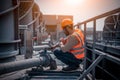 Industry engineer under checking the industry cooling tower air conditioner is water cooling tower air chiller HVAC of large indus Royalty Free Stock Photo