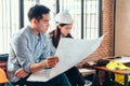 Industry manager and engineer, businessman reading and checking blueprint, drawing in the room