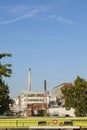 Industry park in Frankfurt hoechst with tank and chimney under blue sky