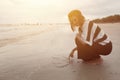 Indy women happy smile draw heart shape on the beach Royalty Free Stock Photo