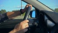 Inside a Car. A Man`s Hands on the Steering Wheel Royalty Free Stock Photo