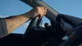 Inside a Car. A Man`s Hands on the Steering Wheel Royalty Free Stock Photo