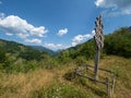 Cross on the trail to Inelet and Scarisoara hamlets, Romania