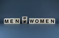 Inequality or equality of man and woman. Cubes form words Inequality or equality of man and woman