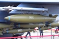 Inert bombs and missiles attached to the wing of RSAF F15-SG fighter jet at Singapore Airshow Royalty Free Stock Photo