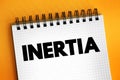 Inertia - object will continue its current motion until some force causes its speed or direction to change, text concept on