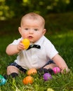 Infant baby boy playing with Easter eggs Royalty Free Stock Photo